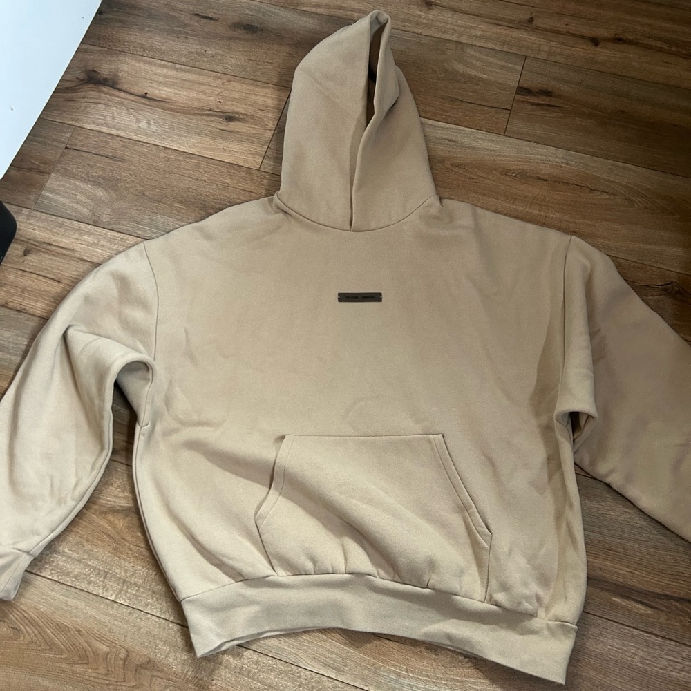 Fear of God ESSENTIALS Classic Hoodie in Timber with Reflective Logo